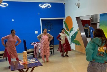 Residents dancing together at The Vintage Assisted Living, Mohali